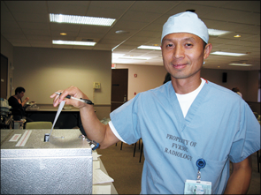 Thuc Do, RN, casts his vote for the new FVPA contract