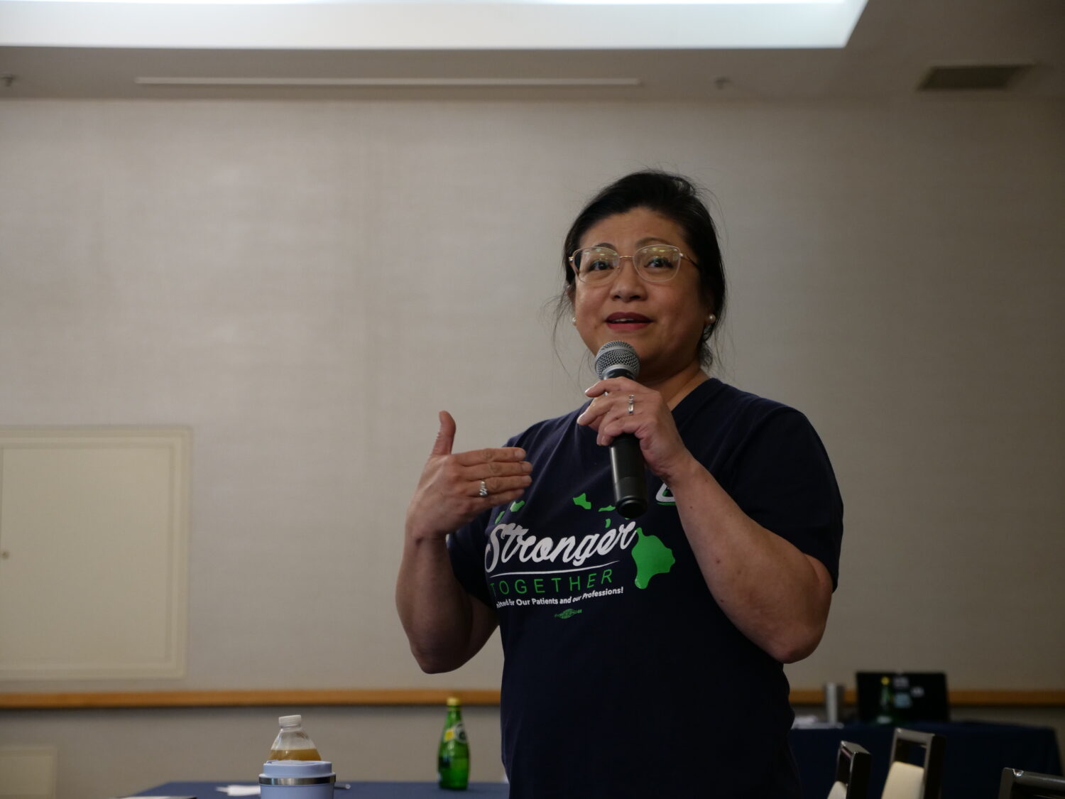 woman speaks into mic